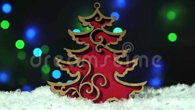 圣诞节装饰<strong>红木</strong>圣诞树上的雪上闪耀的灯光背景